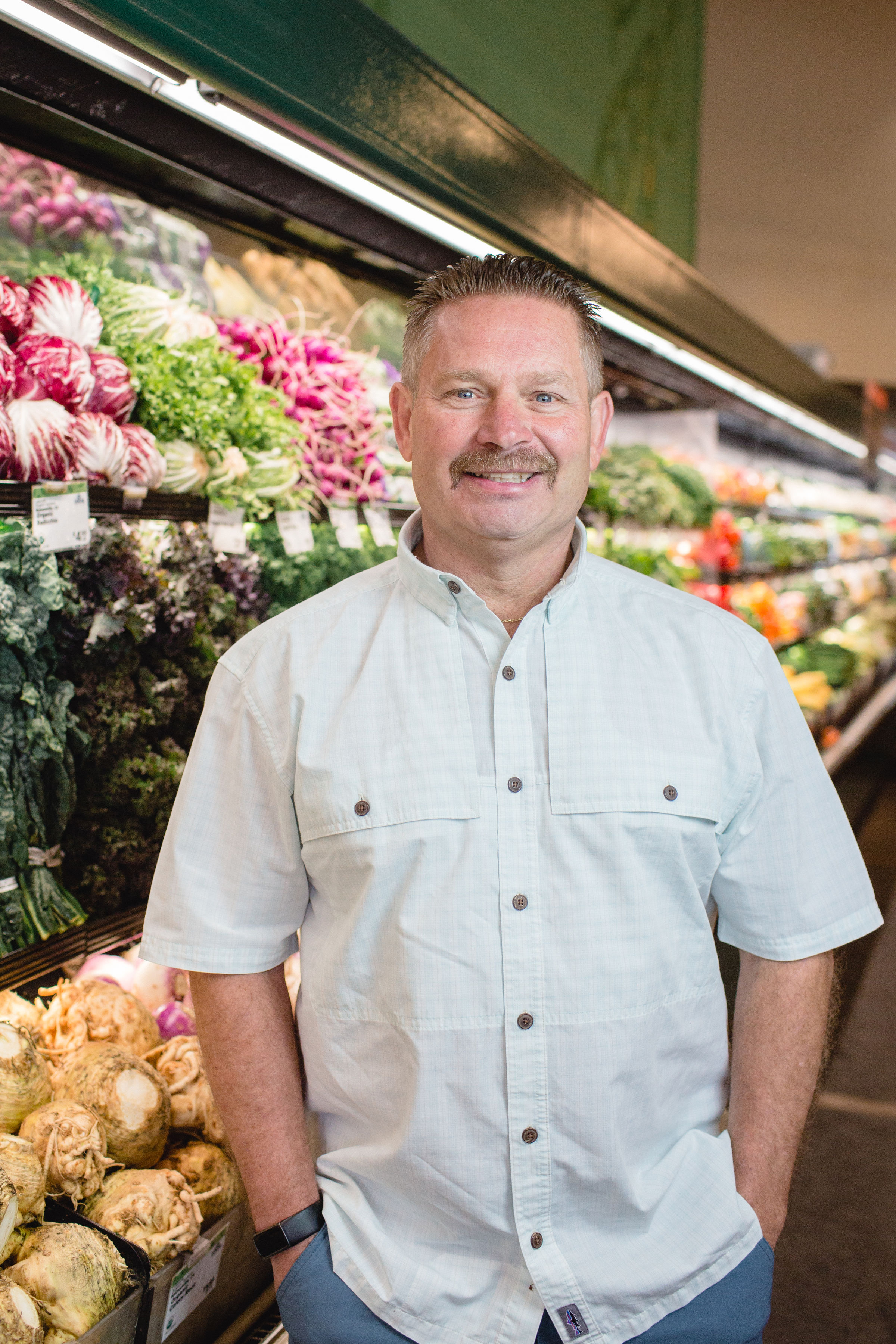 man in produce department 